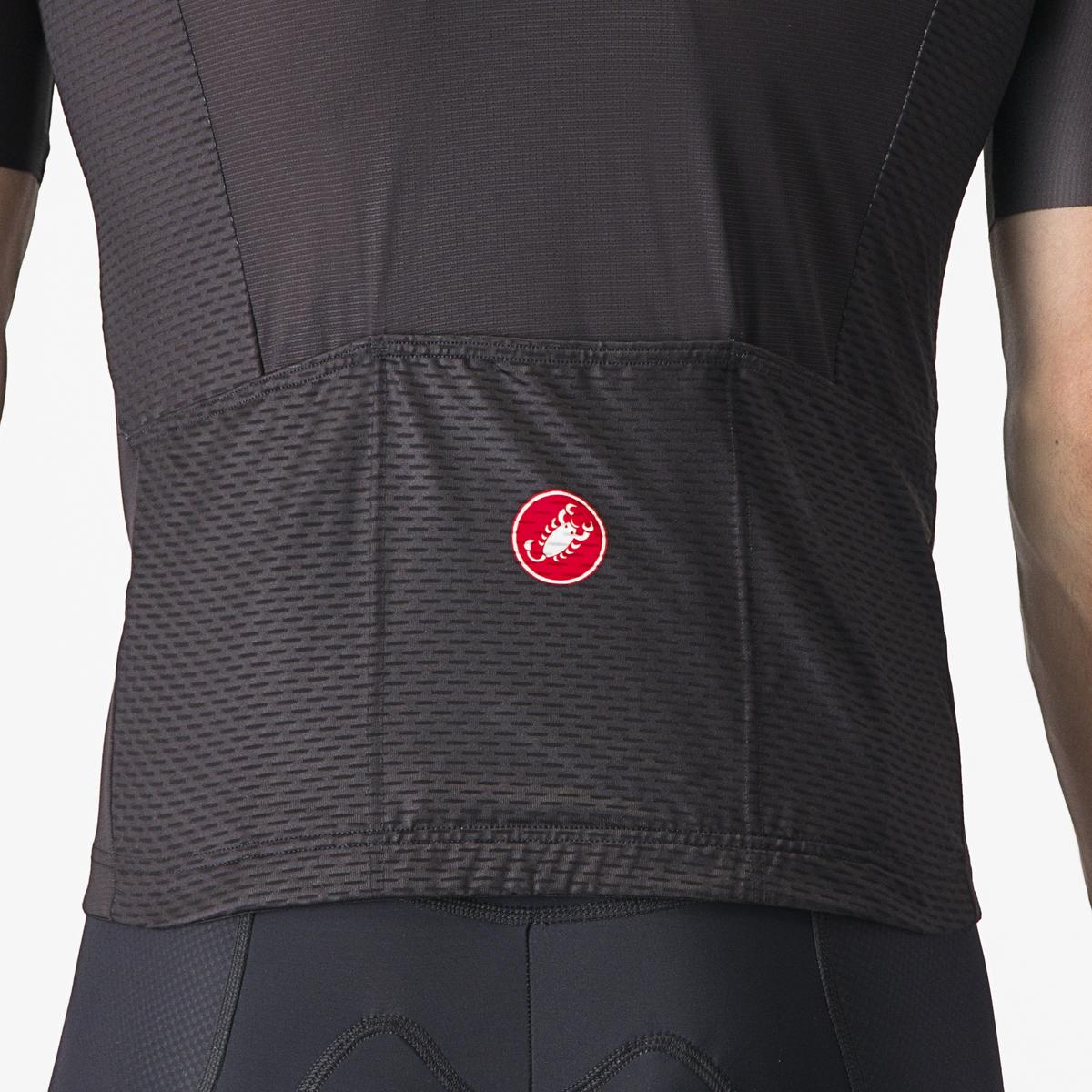 Close up of the back of a black cycling jersey with the red Castelli logo on a white background
