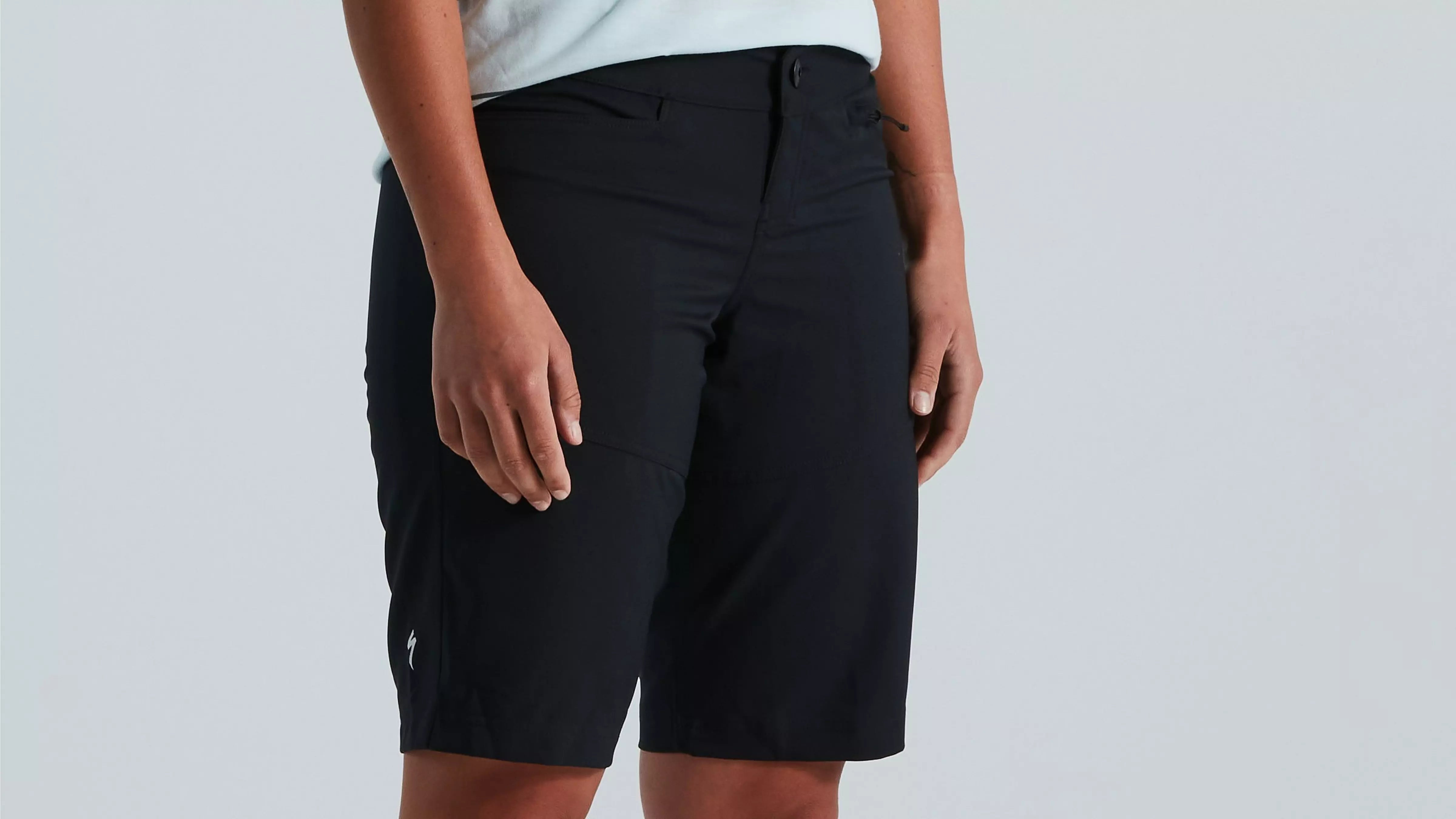 A picture of a lady wearing mountain bike shorts