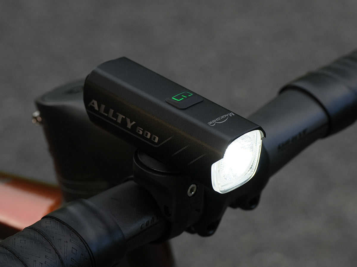 A picture of the Magicshine Allty 600 Front Bicycle Light with the light switched on