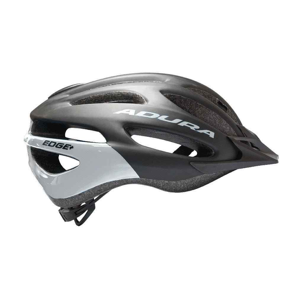 A black/silver Adura Edge+ Commuter Helmet with a visor, featuring adjustable straps and a minimalistic design.