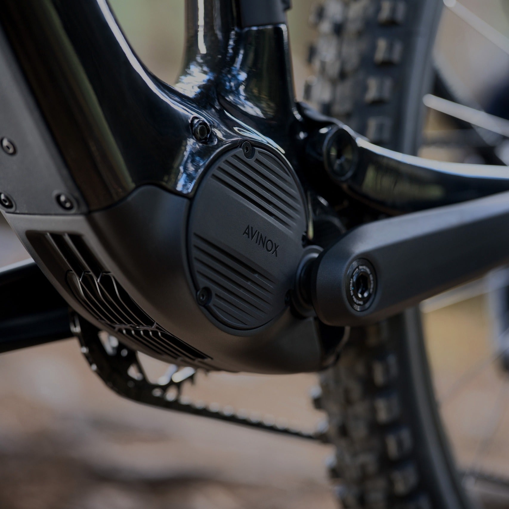 Close-up of an electric bike mid drive Avinox Motor with a blurred background