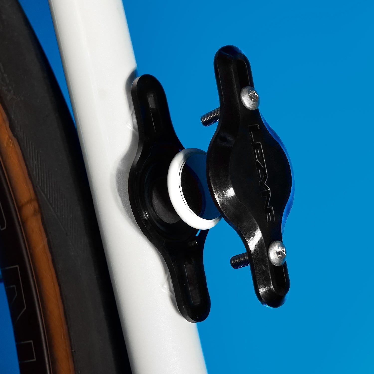 A picture of the Apple Airtag Matrix Bike Tagger fitting onto a bicycle