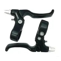 Pair of black bicycle brake levers on a white background