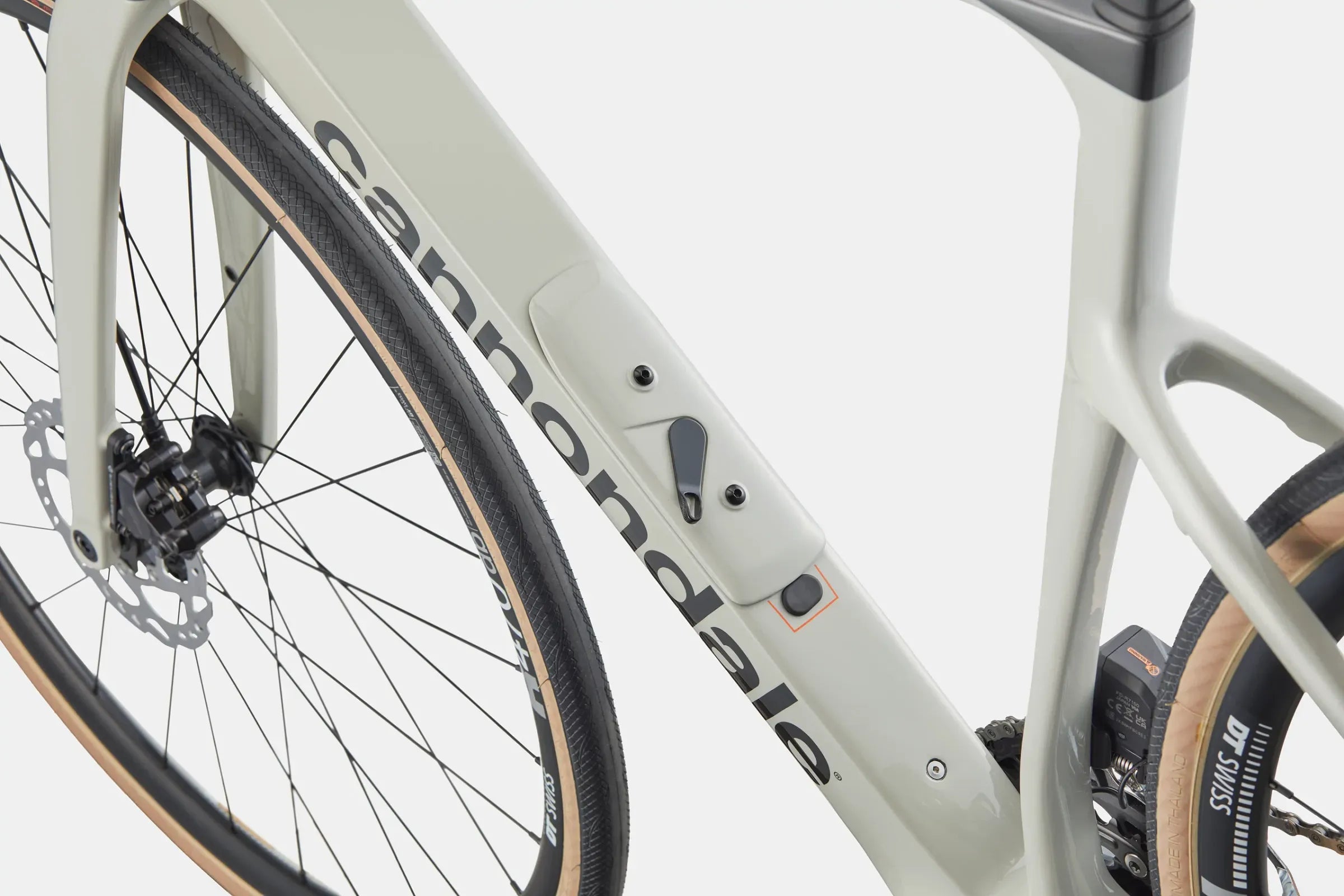 A close up picture of the storage compartment on the frame of a Cannondale road bike