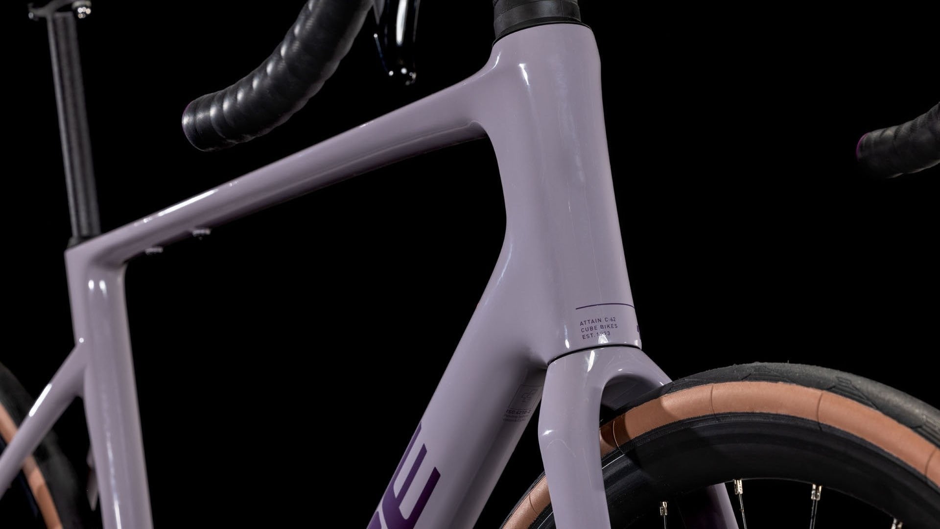 Close-up of a bicycle frame with a dark background