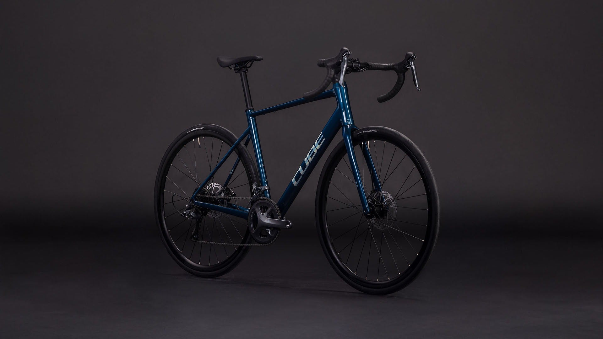 Blue Cube road bike on a dark background