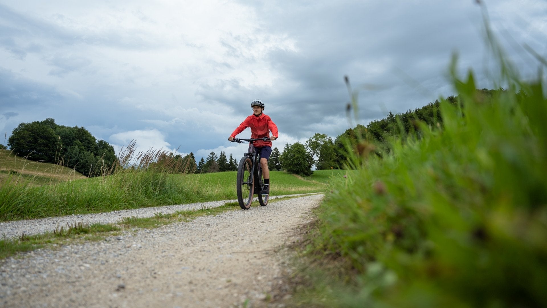 A picture of someone riding the Cube Reaction Hybrid Performance 500 Electric Hardtail Bike