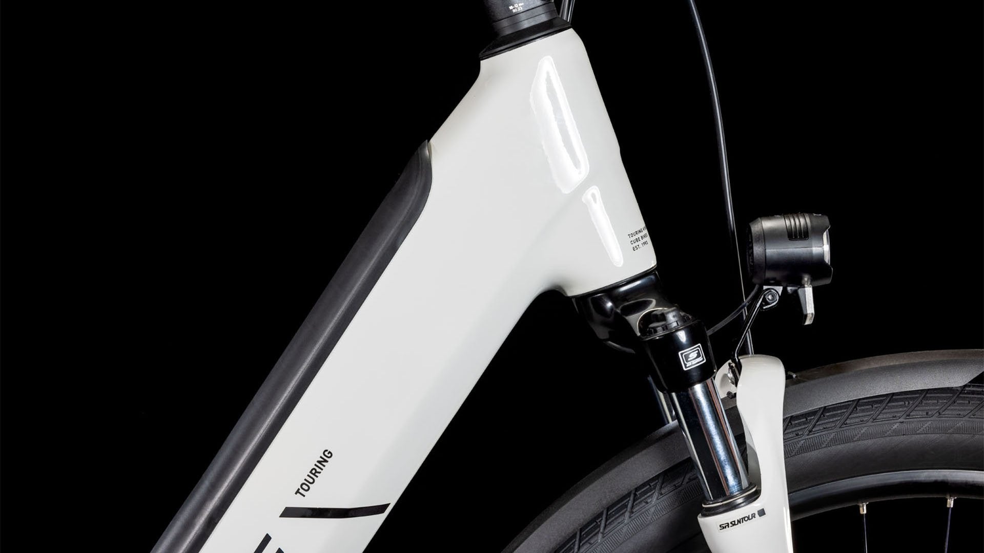 A close up picture of the Cube Touring Hybrid One 500 Easy Entry Electric Bike front light