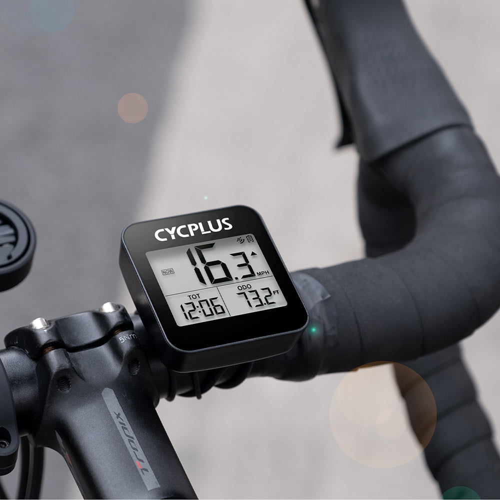 A picture of the Cycplus G1 GPS Cycling Computer on a road bike handlebar