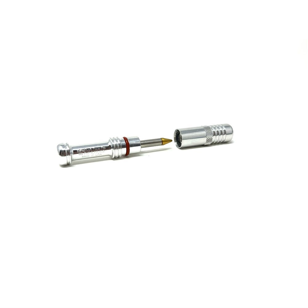 A silver bicycle tubeless repair kit on a white background