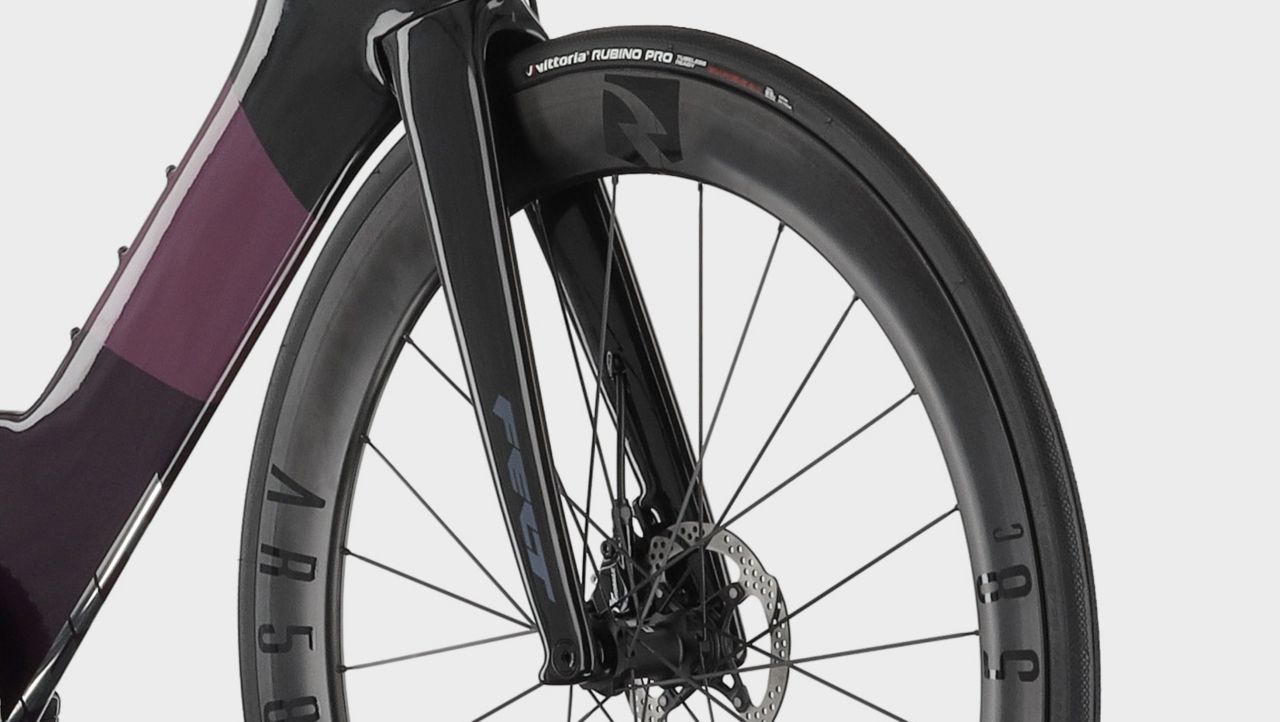 A picture of the front wheel of the Felt IAx Advanced 105 Di2 Tri Bike