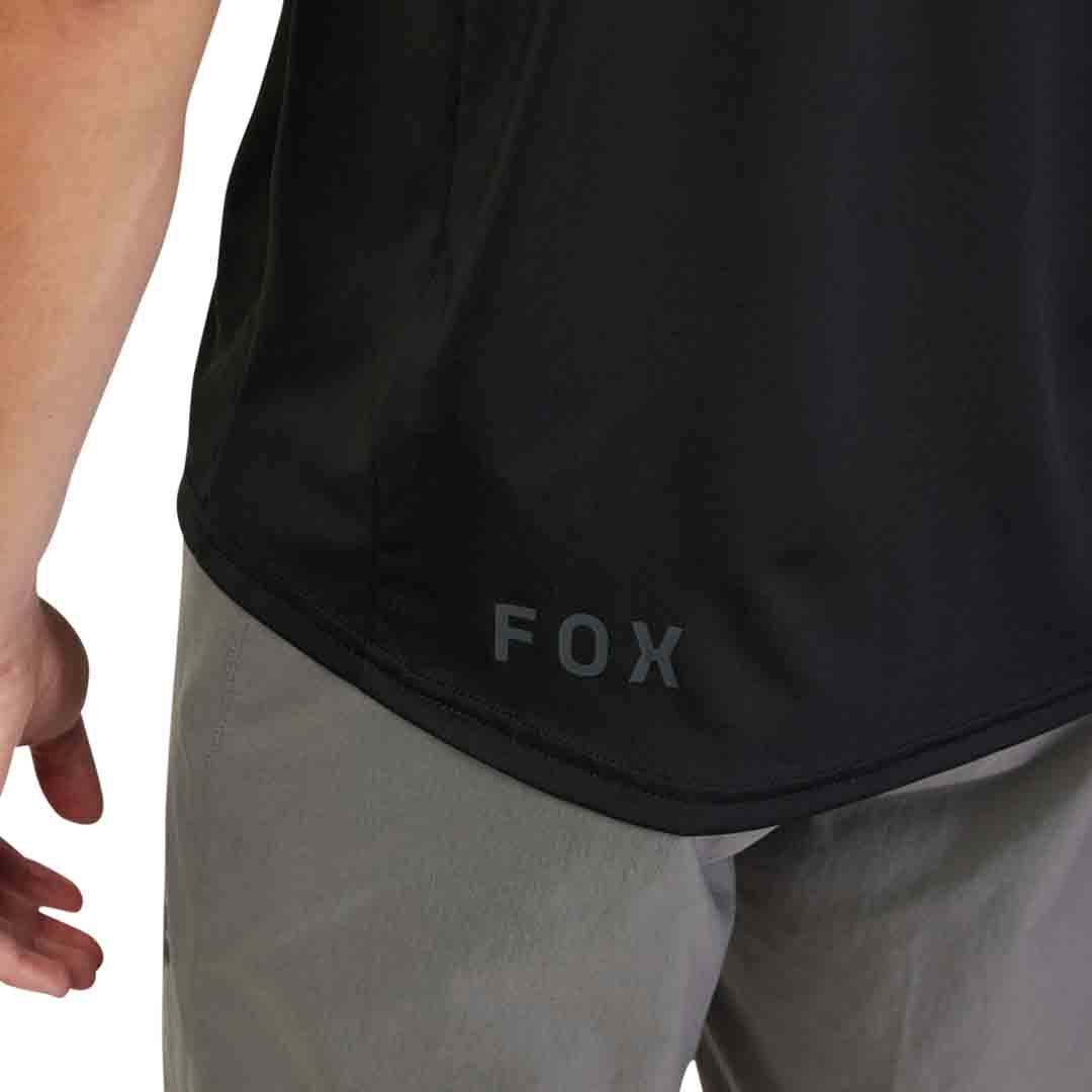 A close up picture of the Fox label on the black Fox Ranger SS Labhead MTB Jersey