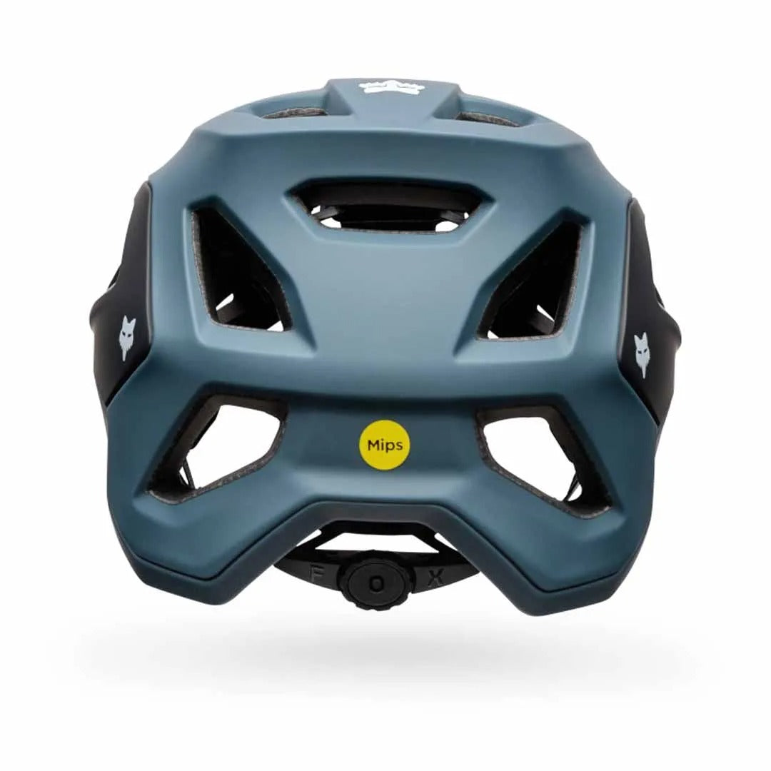 A rear view of a blue helmet with MIPS technology label on a white background