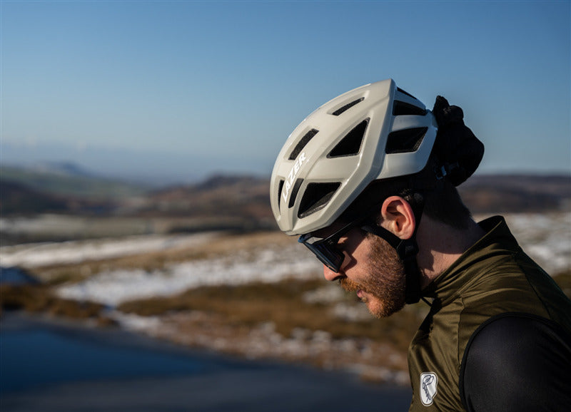 A picture of a man wearing a Lazer Tonic Kineticore Helmet