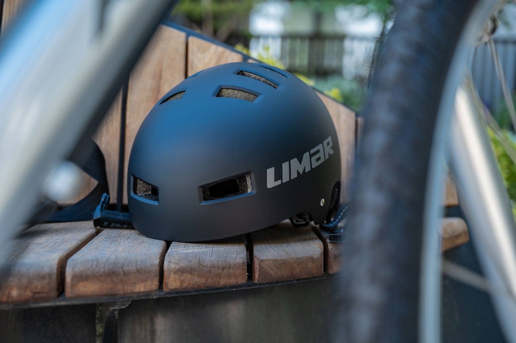 A picure of the Limar 360 BMX Skate Helmet sitting on a bench