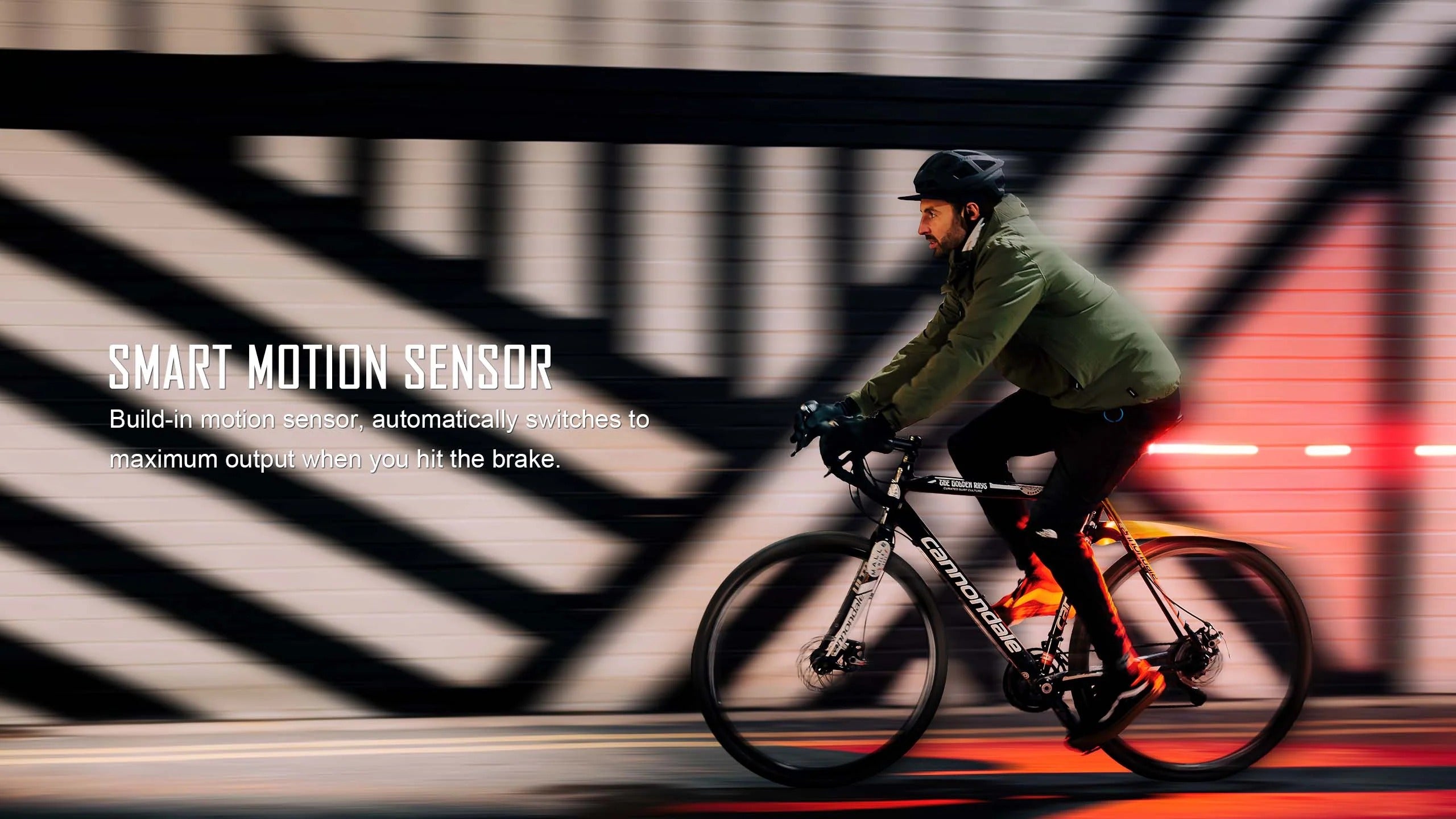 A picture of the Magicshine SeeMee 200 Rear Light attached to a bike showing the Smart Motion Sensor in action