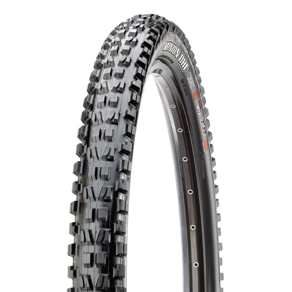 Mountain bike tyre with knobby tread pattern on a white background