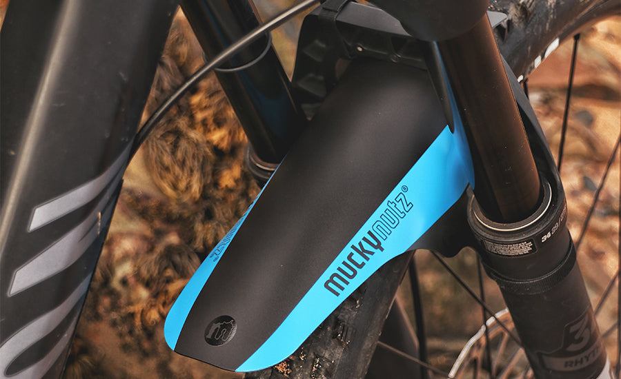 A picture of the blue Mucky Nutz Face Fender Mudguard fitted to a mountain bike