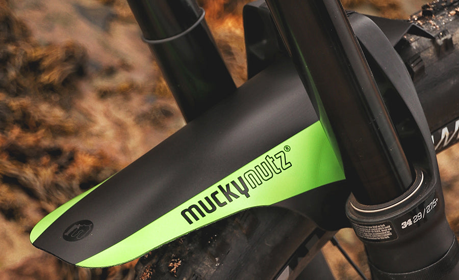 A picture of the green Mucky Nutz Face Fender Mudguard fitted to a mountain bike