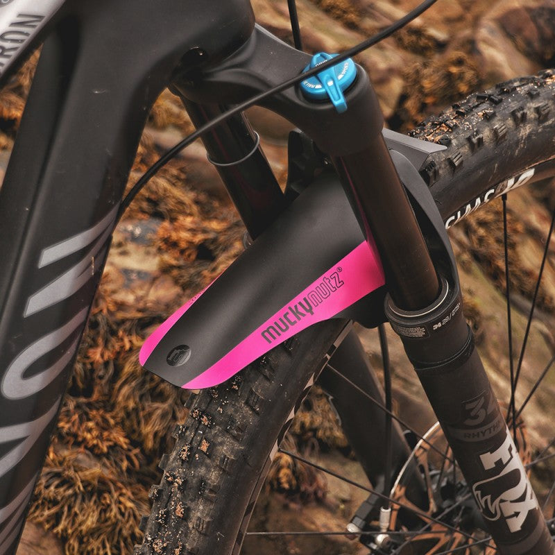A picture of the Magenta Mucky Nutz Face Fender Mudguard fitted to a mountain bike