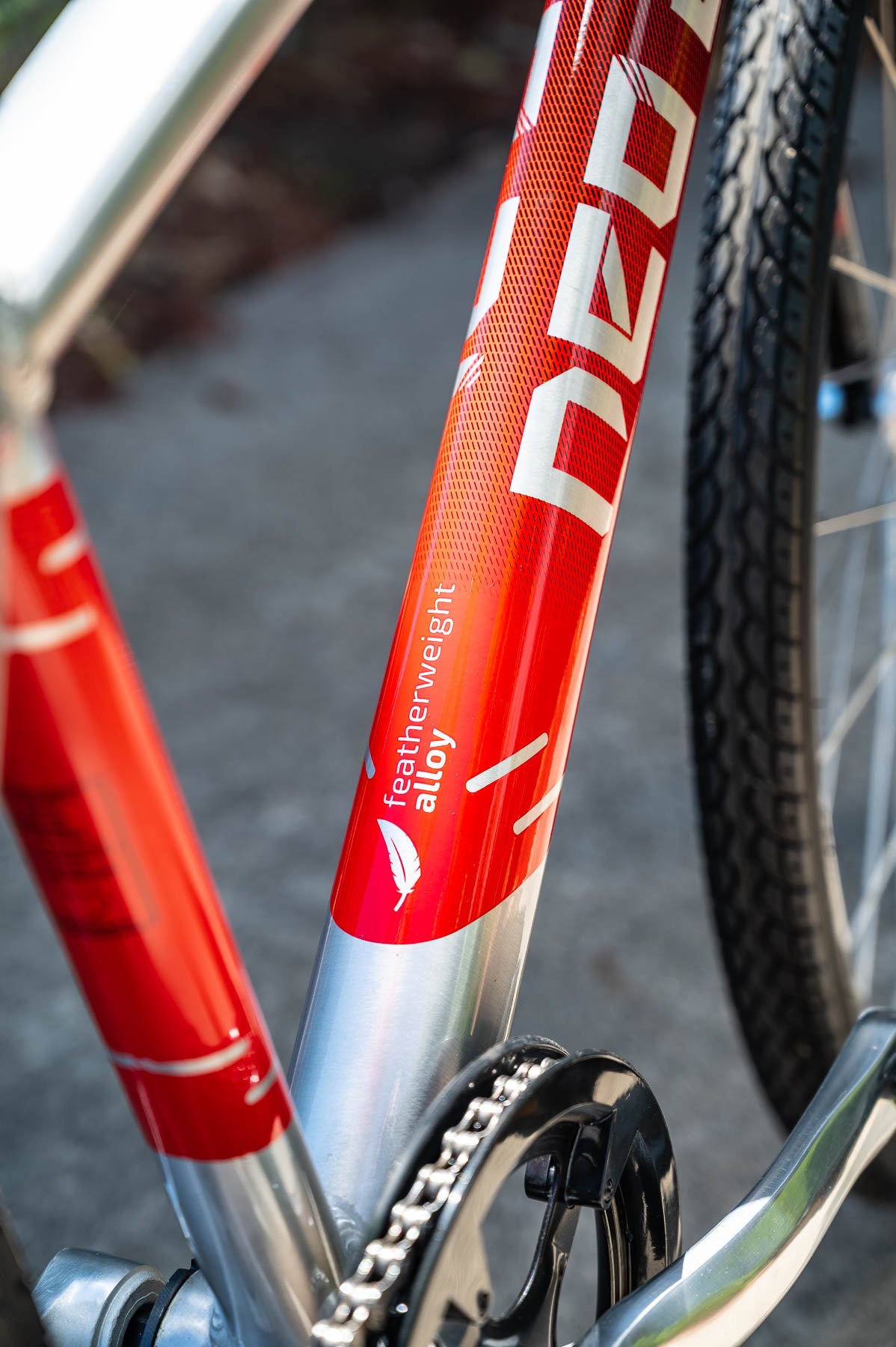 A close up picture of the frame on the black red Neo 20" Boys Bike