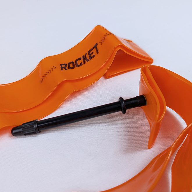 Orange 'ROCKET' TPU Tube with black valve on a white background