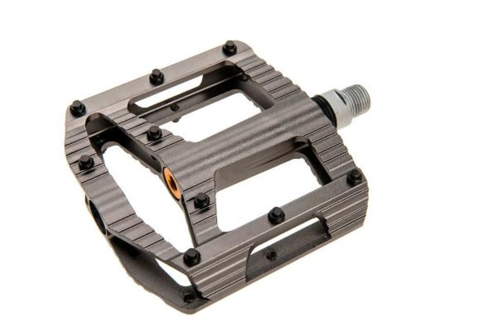 Titanium mountain bike pedal with black pin on a white background