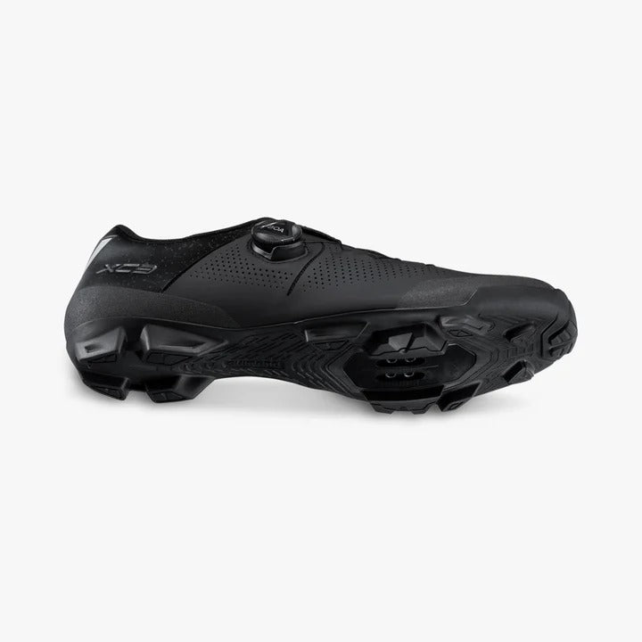 Black cycling Shimano shoe on a white background