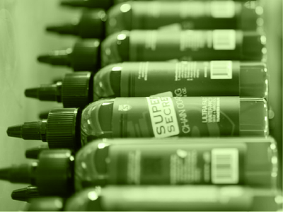 A picture of several bottles of the Silca Super Secret Chain Lube