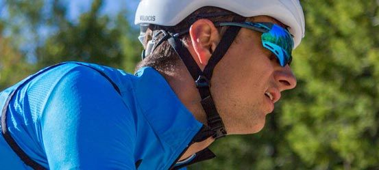 A picture of a road cyclists wearing the Tifosi Alliant Cycling Sunglasses
