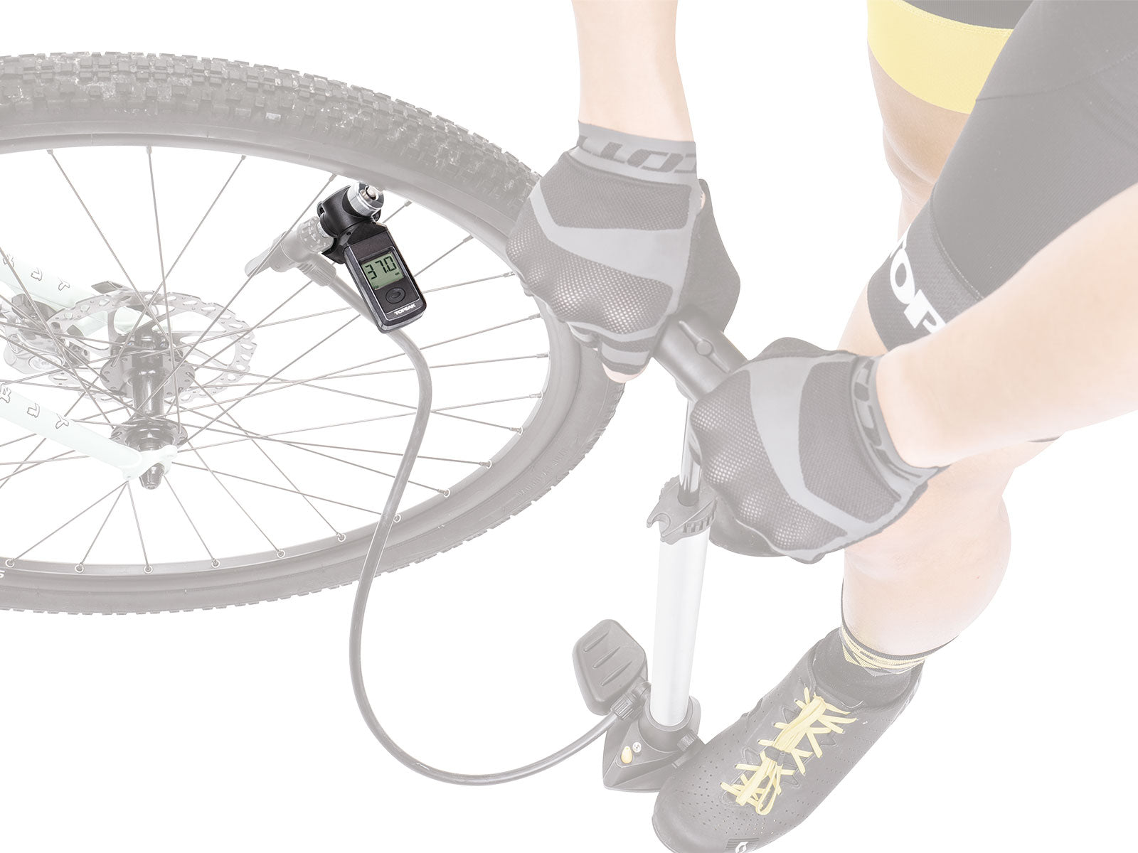 A picture of the Topeak Shuttle Gauge Digital Pressure Gauge for Presta & Schrader being used on a tyre