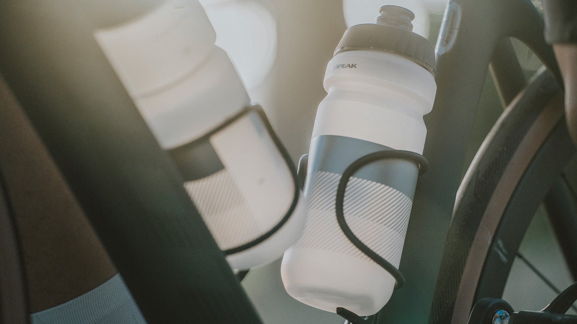 A close up picture of the Topeak Water Bottle in a bottle cage