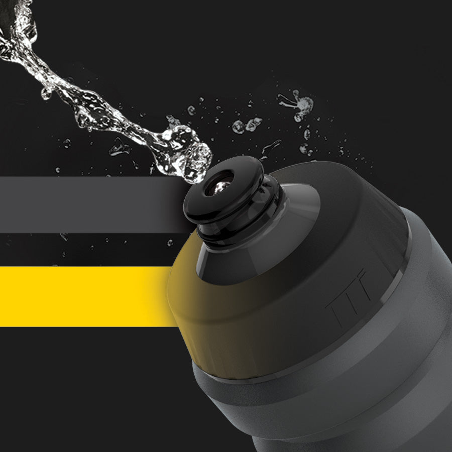 A picture of water squirting out of a Topeak Water Bottle