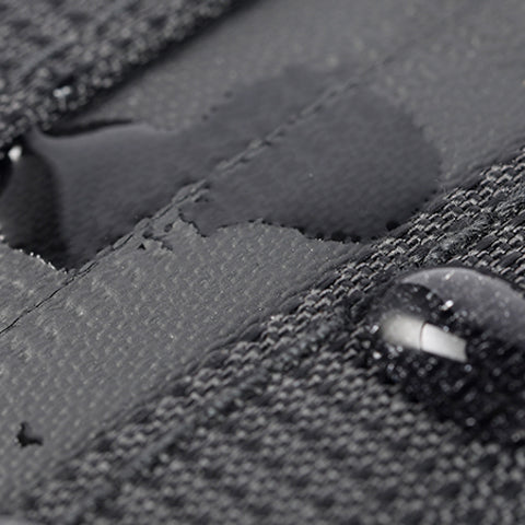 A close up picture of the Ulac Bicycle Trekking Max Toptube Bag 1.6L with water droplets on the fabric