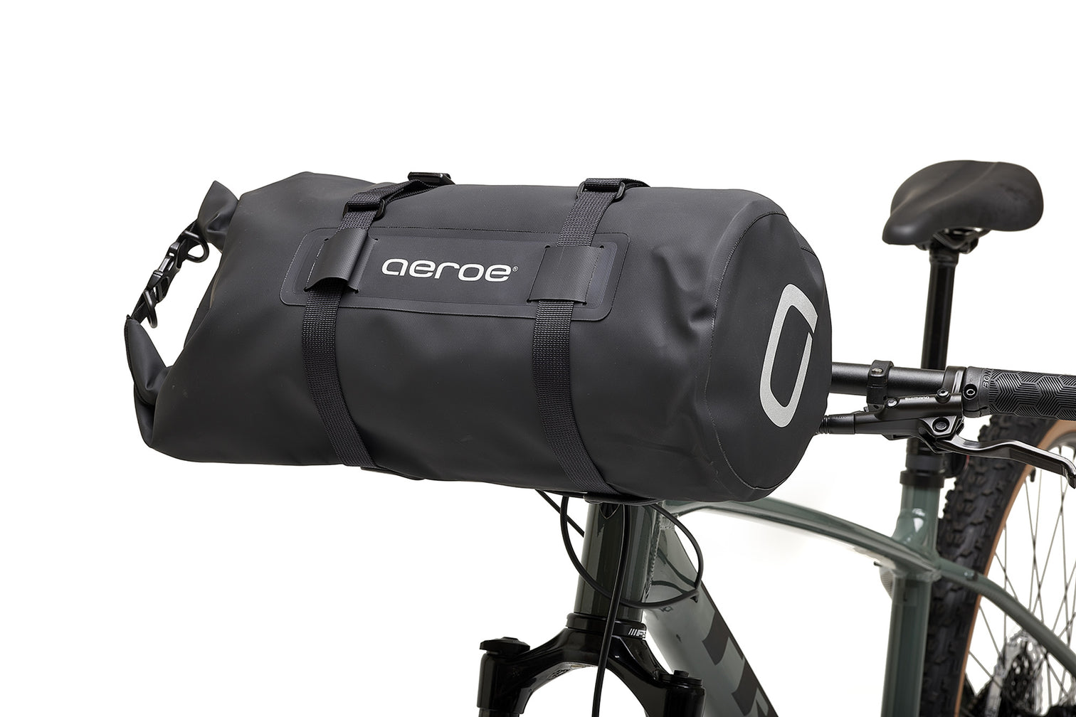 A picture of the Aeroe 12 Litre Dry Bicycle Bag attached to handlebars of a bike