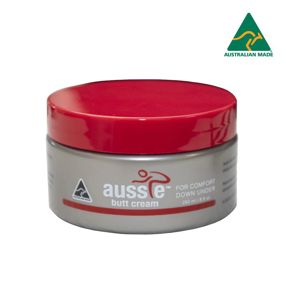 Jar of aussie butt cream with red lid on a white background
