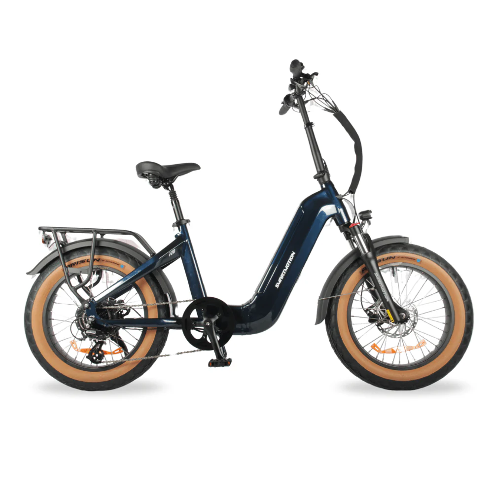 Blue electric bike with tanwall tyres on a white background