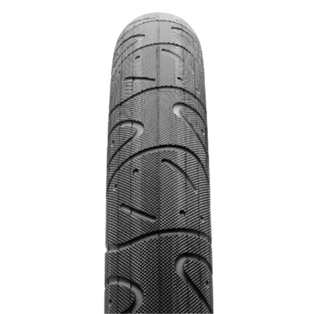 Bicycle tyre with tread pattern on a white background