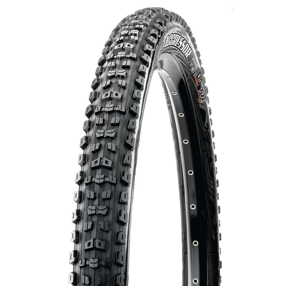 Maxxis Agressor mountain bike tyre showing agressive tread pattern on a white background
