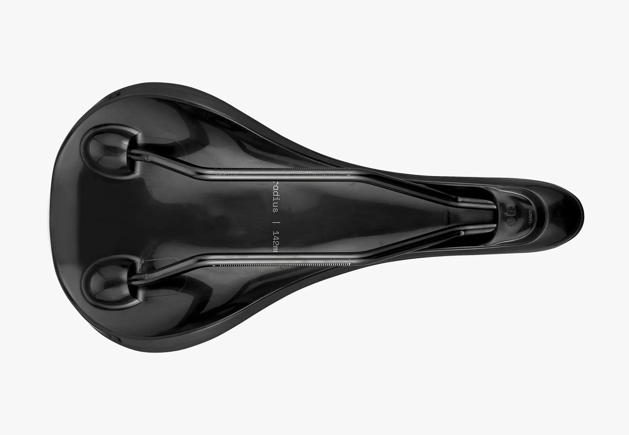 The underneath of a black bicycle saddle on a white background