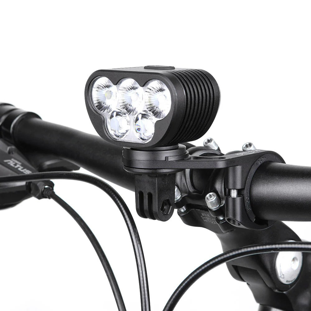 Bicycle light attached to a handlebar on a white background
