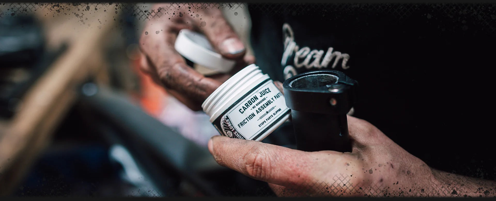 Person holding a jar of Juice Lubes Carbon Paste