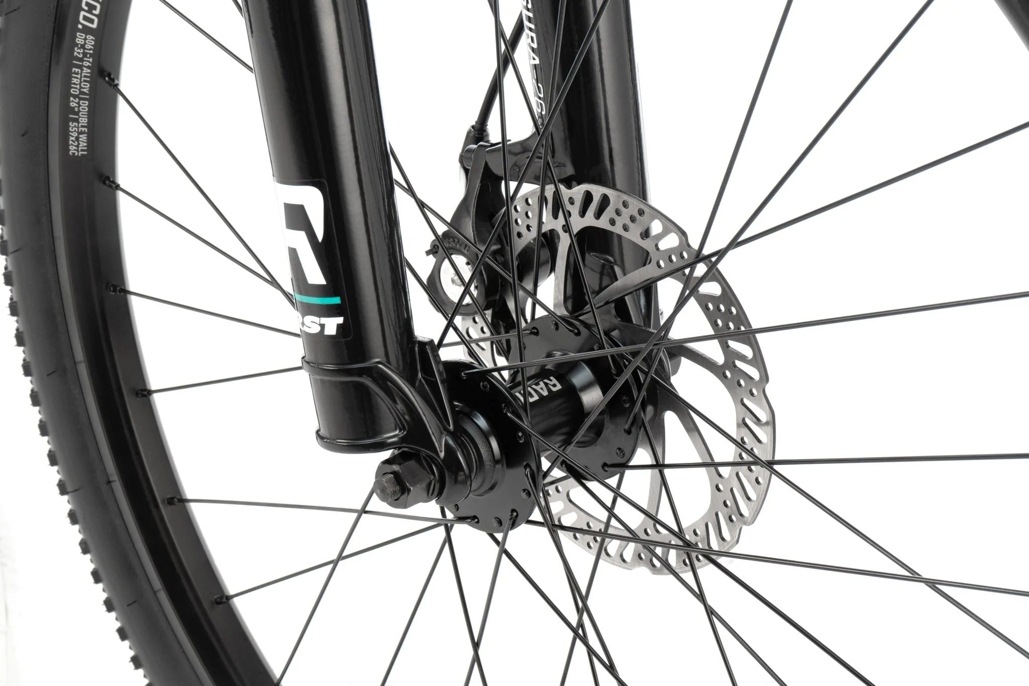 Close-up of a bicycle wheel with disc brake system on a white background