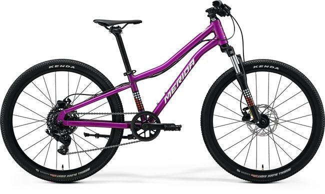 Purple children's Merida bicycle with black components on a white background