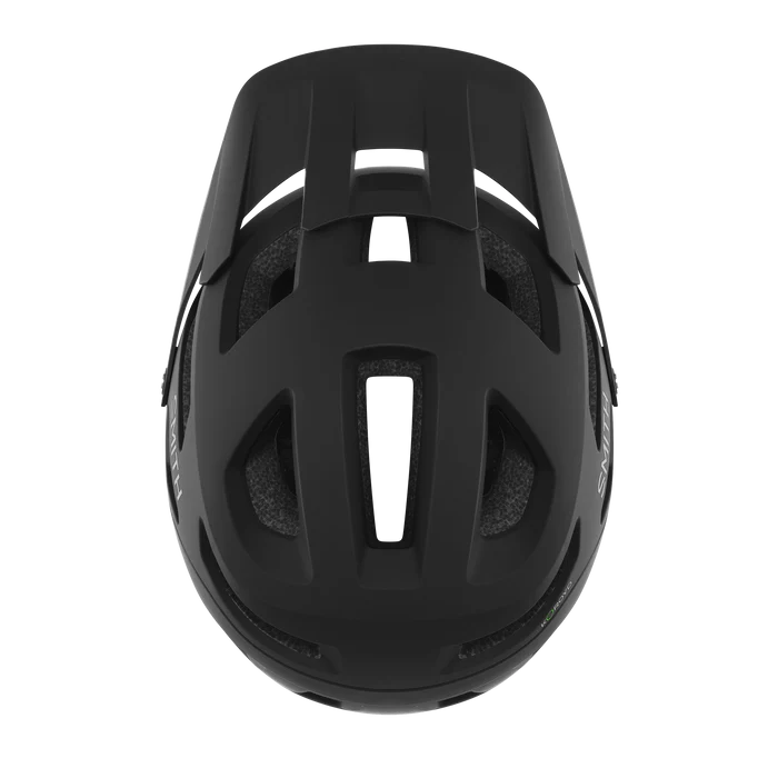 A bird's eye view of a black Smith mountain bike helmet against a white background