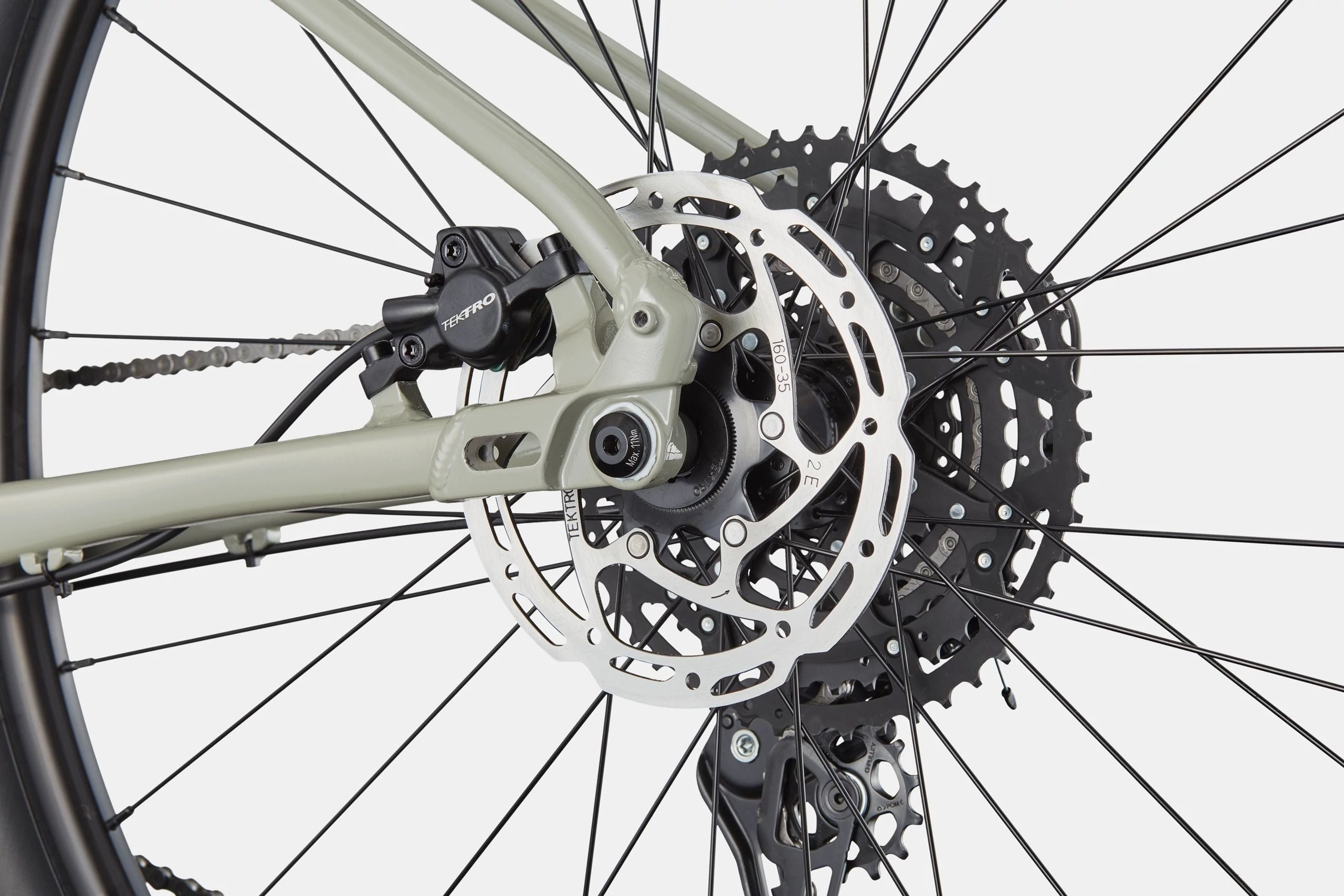 Close-up of a bicycle's gear system on a white background