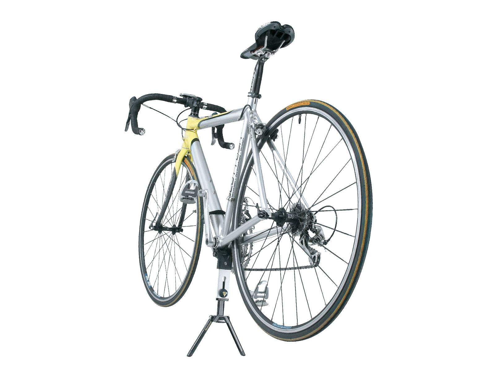 Bicycle on a stand against a white background