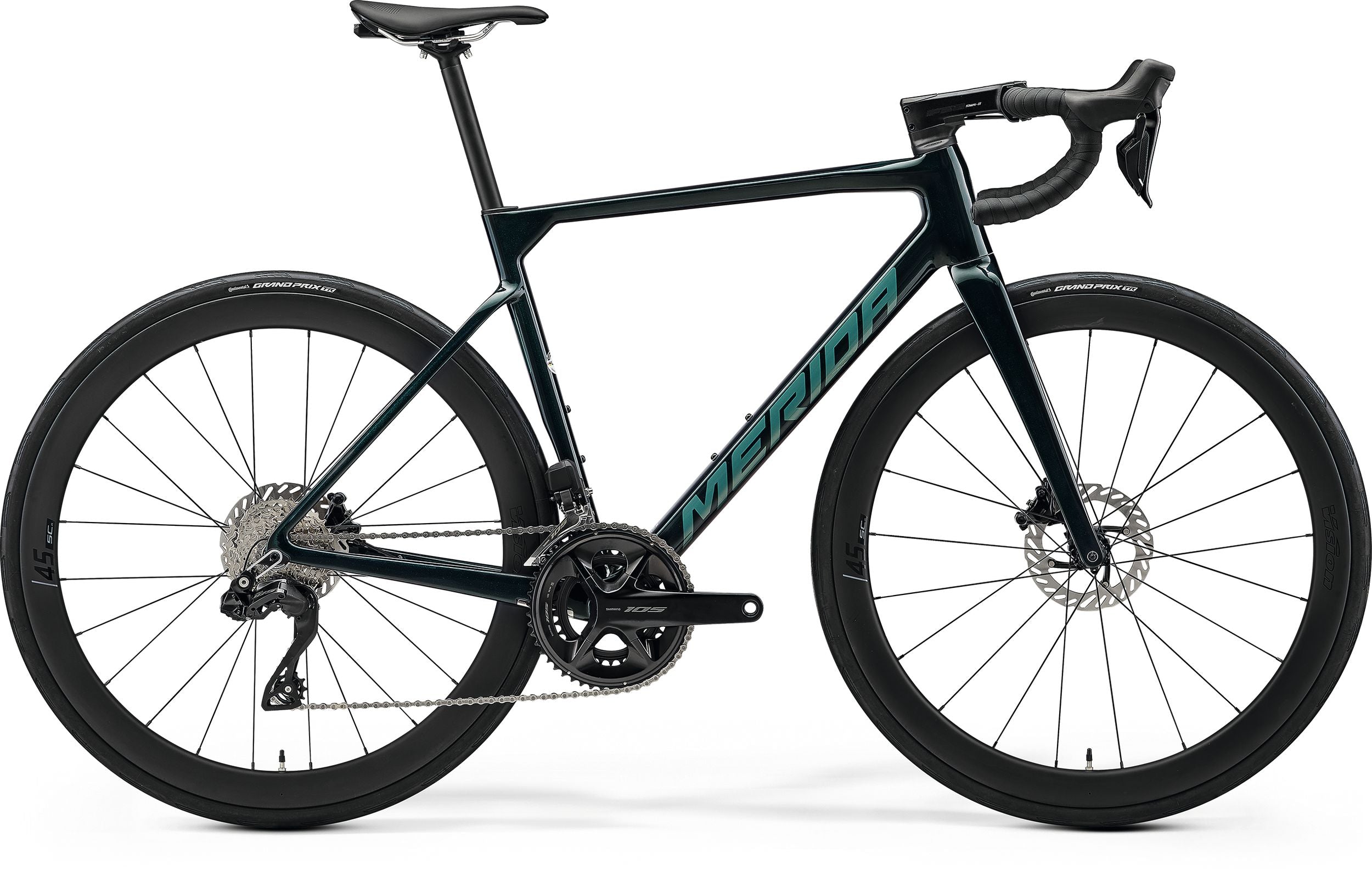 Black and teal Merida road bike on a white background
