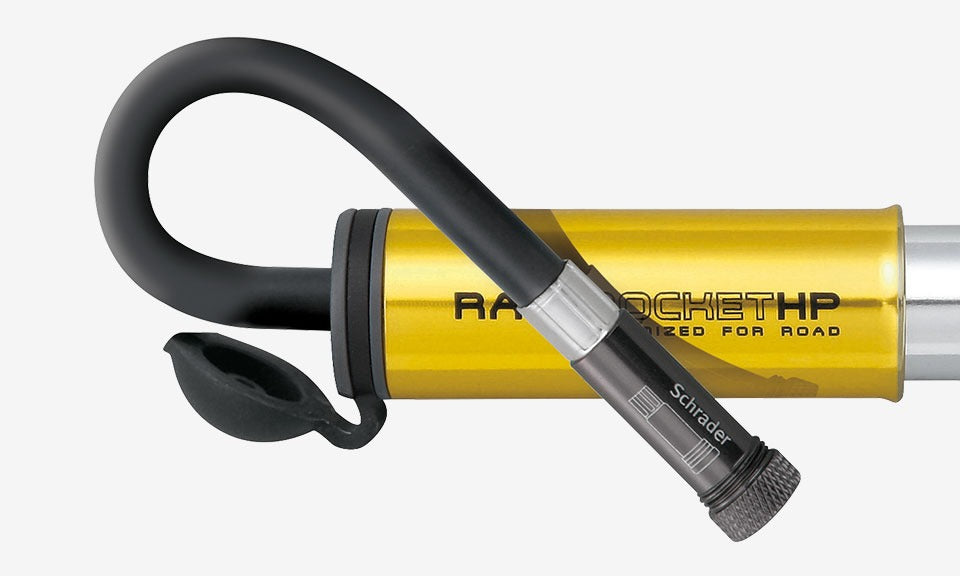 Yellow and black Bicycle hand pump on a white background
