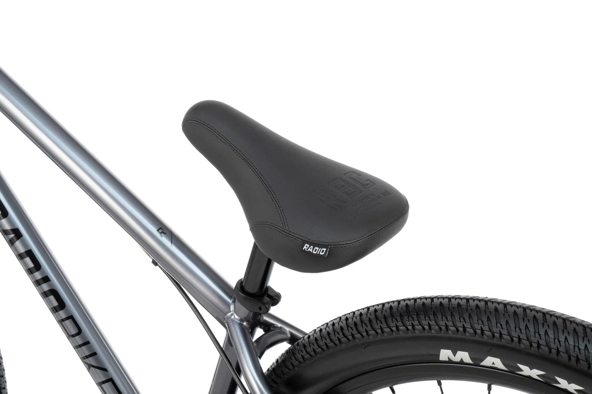 Close-up of a bicycle seat with 'Radio' branding on a white background
